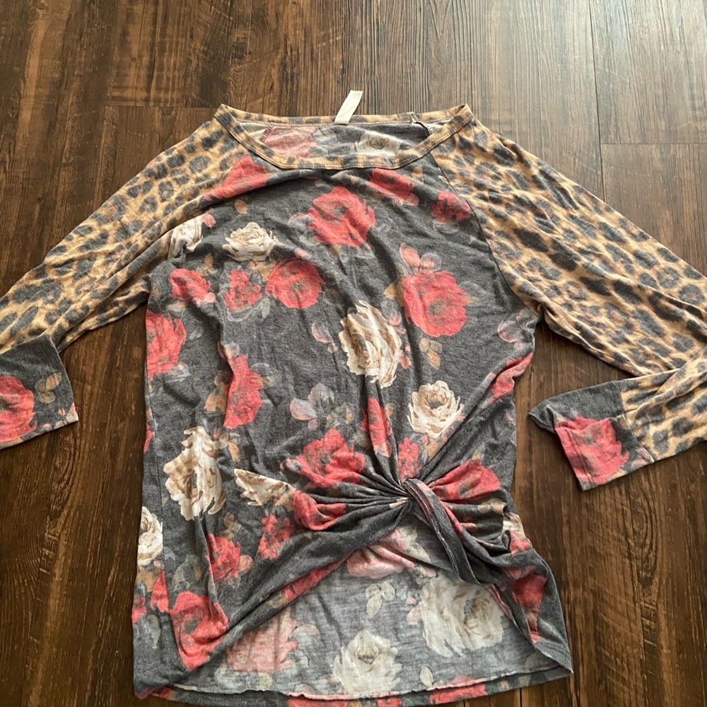 Woman’s floral and leopard top